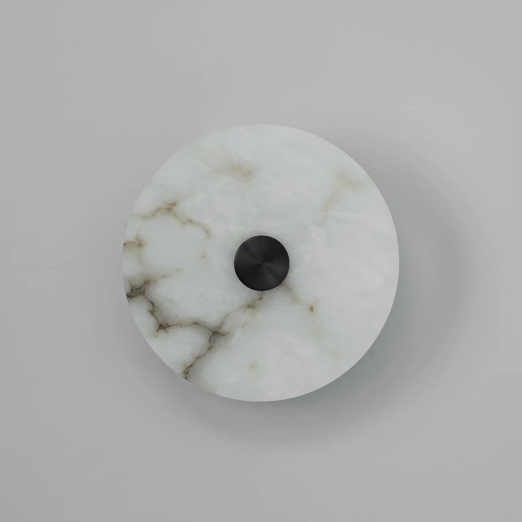 Natural marble wall lamp by lunavera — unique stone veining