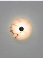 Marble bedside wall light by lunavera in warm white